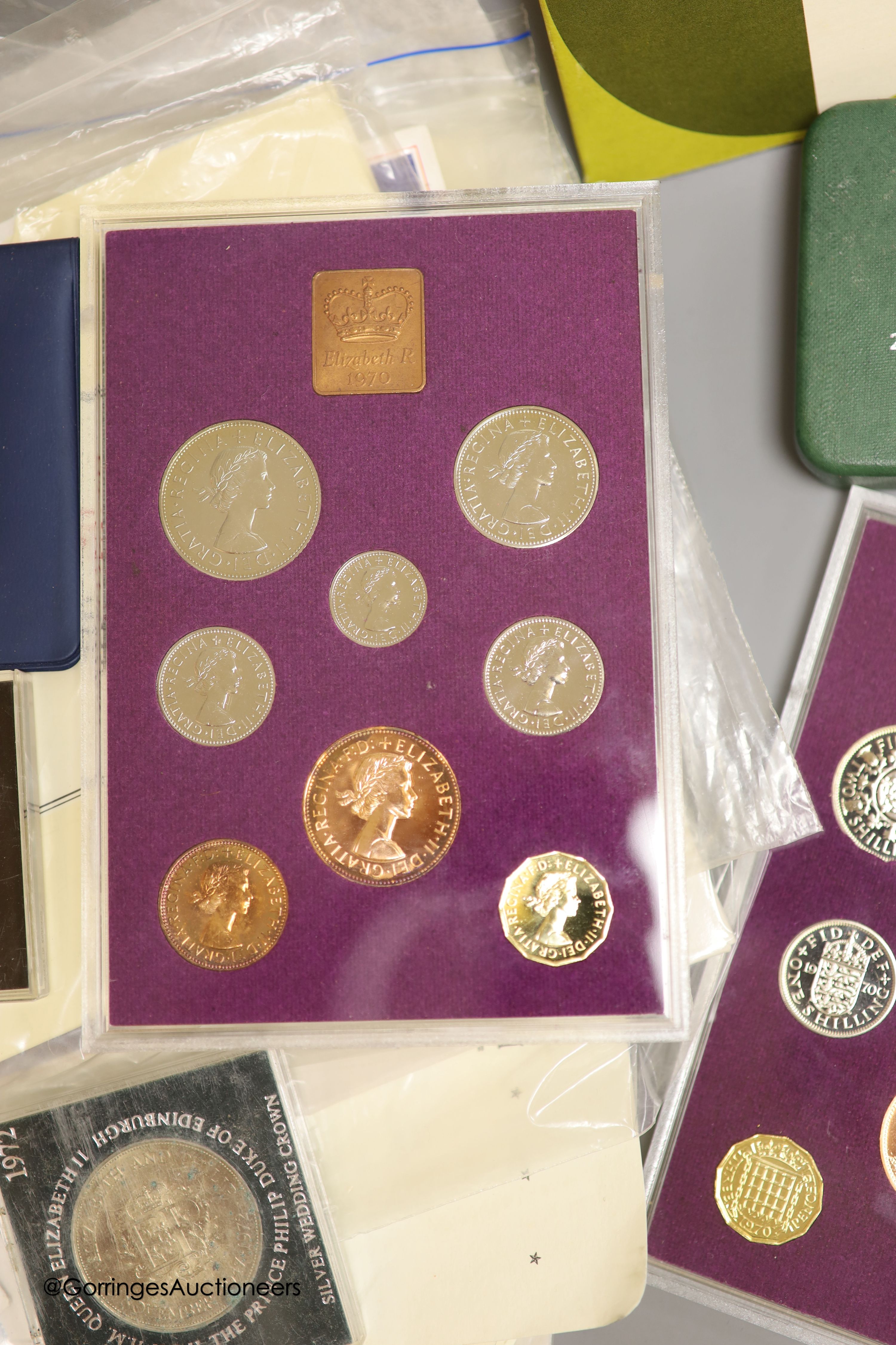 A collection of mostly Royal Mint UK commemorative coins and cover and five UK Brilliant Uncirculated coin collections for 1984 x2, 1986 x2 and 1987.